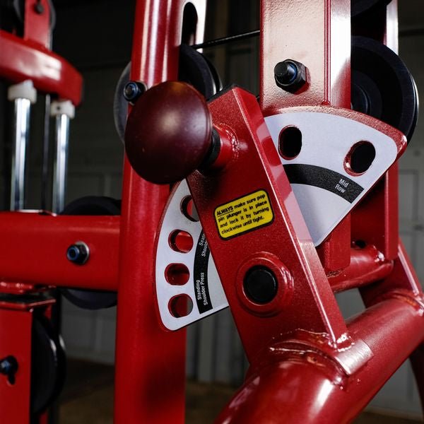 Close-up of the press arm adjustment knob area on the Best Fitness by Body-Solid Single Stack Home Gym BFMG30.