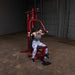 Female athlete performing a slightly bent forward chest press on the Best Fitness by Body-Solid Single Stack Home Gym BFMG30.