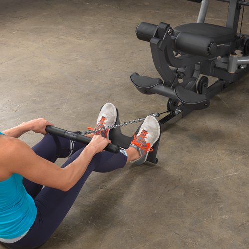 Female athlete performing low row exercise using low row cable attachment on Body-Solid G5S Home Gym.