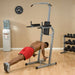 Athlete performing push-ups on VKR Chin Dip Station’s push-up bars
