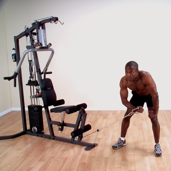 Black male performing a one-arm bent-over row using the low row cable with a single handle cable attachment on the Body-Solid G3S Home Gym."